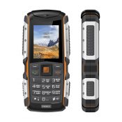 Кнопочный мобильный телефон Texet TM-513R в черном цвете с оранжевой вставкой. Вид спереди.